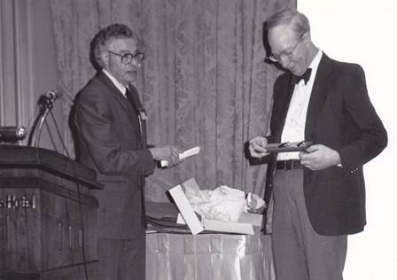 Marshall Yovits receiving thank you gift from Orrin
Taulbee.